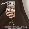 Pulseira de gato com estampa de leopardo adequada para capa de celular Apple 16 Pro Max, iPhone 17, Maillard 15, outono e inverno 14, fofa