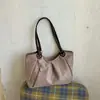 Bolsa transfronteriza para mujer, nuevo estilo 2026, estilo coreano, bolsa de mano de lunares para mujer, gran capacidad, para ir al trabajo, de un solo hombro, para el antebrazo, versátil