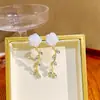 Pendientes de Pétalo Blanco Estilo Coreano de Alta Gama Silver Needle con Elegante Borla de Flor Transparente y Perlas de Presión