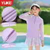 Traje de baño para niñas 2026 Nuevo estilo Niñas pequeñas y niños mayores Estilo falda dividida Manga larga Protección solar Secado rápido Traje de baño
