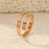 Joyería de Acero Inoxidable de Venta Caliente Transfronteriza, Diseño de Moda y de Alta Gama, Cruz Abierta de Acero de Titanio, Anillo Ajustable para Hombres y Mujeres