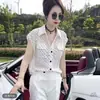 Moda Verano 2026 Lujo Ligero Ligeramente Transparente Lunares Solapa Manga Corta Camisa para Mujer Elegante Versátil Top Delgado