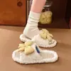 Zapatos de casa casuales de cuadros con lazo de tacón plano para otoño e invierno 2026 zapatillas de felpa para mujer antideslizantes modelo nuevo