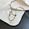 Colar de Florzinha Pequena com Contas em Corda Trançada Feminino Outono Retro Puxar Ajustável Acessórios Corrente de Suéter Longa Personalizada Versátil