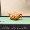 Alça de bule em formato de abóbora de sândalo natural, uma peça decorativa, um pequeno ornamento, um item portátil para carregar, um bule de mão