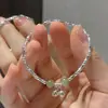 Pulseira Floral de Verão Fresca e Doce Atacado, Estilo Pastoral, Pulseira de Flor de Pérola Transparente e Versátil com Folhagem e Pedras para Mulheres