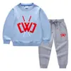 Ropa infantil transfronteriza nueva Otoño e Invierno 2023 suéter para niños pantalones traje de dos piezas color liso bebé algodón manga larga
