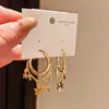 Anel Cool Starfall ~ Estilo Luxo Leve Brinco de Estrela com Pingente de Gotejamento de Óleo Brincos da Moda Personalizados Ornamentos de Orelha com Toque de Nicho de Alto Padrão para Mulheres