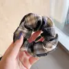 Scrunchie Estiloso e Relaxado com Borlas Delicadas, Acessório de Cabelo de Alta Qualidade para Primavera/Verão, Elástico de Cabelo Versátil