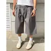 Shorts a rayas de pierna ancha estilo simple retro americano para hombres y mujeres, verano holgado casual tridimensional moderno ins