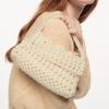 2022 nuevo bolso pequeño bolso de mujer perla artificial blanca portátil hombro mensajero mini bolso tejido con cuentas verano