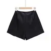 Atacado Exportação Transfronteiriça Roupas Femininas 2025 Outono e Inverno Estilo Europeu e Americano Cintura Média Pu Short Saia Culotes Feminina F71144