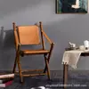 Silla plegable de cuero Monet Silla de ocio para balcón de madera maciza nórdica Silla de caza de diseñador retro