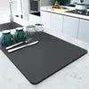 Alfombrilla de secado para fregadero de cocina de color liso transfronteriza, nueva alfombrilla de escritorio de tierra de diatomeas para fregadero, alfombrilla absorbente resistente al desgaste, alfombrilla aislante térmico antiescaldado al por mayor