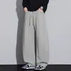 Calça Casual de Tricô com Corte Curvo Nova para Outono/Inverno 2026 para Homens, Calça Versátil de Perna Reta Solta da Moda Americana para Homens