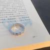 "Caminhando com Você" de Ming Jie Casal para Anelar um Par de Anéis Femininos Design de Nicho Commemora Coisa Boa