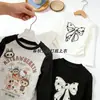 Camiseta de Manga Longa para Meninas 2026 Nova Coleção Primavera e Outono para Crianças Maiores Versátil Ins Laço Infantil Camiseta Básica Doce