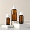 Botellas de vidrio marrón para aceites esenciales de 5-100 ml en stock para esencia, hidrosol, perfume, con tapa a prueba de manipulaciones, botellas grandes de vidrio marrón