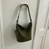 Bolso de axila tejido de patrón retro de nicho, bolso tipo cubo para mujer, nuevo bolso de hombro cruzado de gran capacidad popular de moda 2026