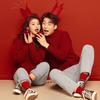 Este año suéter rojo para hombres y mujeres otoño e invierno cuello redondo forro polar Año Nuevo color liso suéter comercio exterior fábrica envío directo al por mayor