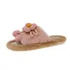 Pantuflas casuales zapatos cálidos color liso suela suave felpa con flores ropa de casa hombres mujeres antideslizantes pantuflas de algodón estilo nuevo fondo plano 2026