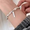 2025 Pulsera de Perlas Más Vendida para Mujer Versátil Gama Alta Nuevo Estilo Chino Retro Pulsera de Mano Temperamento Joyería de Mano Mariposa Venta al por Mayor