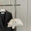 Bolsa Única Texturizada para Axila Feminina 2026 Nova Moda Bolsa de Mão Bolsa de Boliche Versátil para o Dia a Dia Bolsa de Ombro Shell