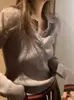 Camiseta de punto de cuello polo de alta gama coreana para mujer, estilo principios de otoño, top súper bonito y único