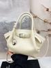 Bolsos de Gama Alta de Comercio Exterior para Mujer 2025 Nueva Moda Nicho Verano Bolso Bandolera de Hombro Único Popular Bolso Balde Plisado