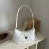 Nova bolsa tiracolo estilo coreano de alta moda para o início do outono de 2026, bolsa de ombro estilosa, bolsa simples para o dia a dia sob o braço, bolsas femininas no atacado