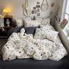 Ventas Directas de Fábrica Algodón Lavado Juego de Cuatro Piezas Pequeño Fresco Estilo Femenino Suave Dormitorio Juego de Tres Piezas Juego de Sábanas Estampadas