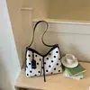 Bolso de mano informal simple de lunares transfronterizo para mujer, nuevo de moda verano 2026 de alto valor, para el trabajo, de hombro y cruzado
