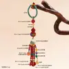 Al por mayor Mineral Crudo Natural Alto Contenido Cinabrio Rojo Mantra de Seis Palabras Calabaza Pintada Llavero Borla Colgante de Bolso Accesorio