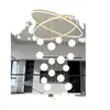 Lámpara de araña para sala de estar dúplex 2026 nuevo modelo villa entrepiso hueco araña grande loft techo alto luz de escalera
