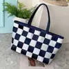 Bolso de mujer nuevo de gran capacidad otoño e invierno estilo coreano transfronterizo moda simple casual tejido portátil bandolera bolso de mujer versátil