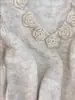 Suéter de Crochê com Padrão de Camélia Gola V Feminino Outono/Inverno 2026 Estilo Suave Coreano Solto Chique Top Rejuvenescedor