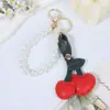 Moda Cruzada Europeia e Americana Chaveiro Fofo de Cereja Pingente com Contas de Pérola Design em Couro PU em Formato de Coração Pingente para Bolsa