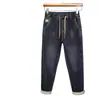 Novas calças casuais de outono e inverno, cintura elástica moderna, forradas com fleece, jeans de brim espessado, calças de algodão masculinas soltas stretch slim-fit