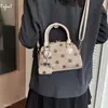 Nuevo bolso de mano cruzado de moda para mujer, exquisito, de ante, para ir al trabajo, otoño 2026, de un solo hombro, con estampado de lunares de bola de boliche