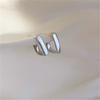 Aretes geométricos cuadrados de tuerca para mujer Lujo ligero simple moda combinable diseño de nicho personalizado aretes de moda de alta gama
