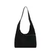 Bolsa de Ombro com Rebites Feminina 2026 Outono/Inverno Nova Estilosa para o Dia a Dia Bolsa de Ombro Única Casual Grande Capacidade Versátil Bolsa Tote