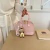 Nova Bolsa Rosa de Concha para Mulheres Primavera 2026, Bolsa de Ombro de Nicho Estilo Coreano de Luxo Leve, Bolsa Transversal Versátil para o Dia a Dia