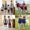 Uniforme escolar de primaria traje de primavera y otoño uniforme de jardín de infancia estilo académico uniforme de clase de deportes conjunto de cuatro piezas para niños de primer grado