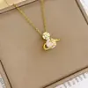 Collar de Acero de Titanio Brillante Planeta Chapado en Oro Real Cadena para Clavícula de Verano Nicho Moda Elegante Versátil Colgante Cadena para Clavícula