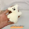 Muñeco de peluche de dibujos animados de Navidad sombrero de Navidad broche de marfil pin para bolsa de perro accesorios de decoración de oso bufanda
