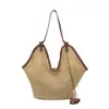 Bolsa de palha trançada estilo francês para mulheres, nova moda verão 2026, grande capacidade, versátil para o dia a dia, bolsa de ombro e debaixo do braço