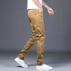 Calças Casuais Masculinas Primavera Outono Novas Cáqui Business Slim Fit Calças Tubo Masculinas Elásticas Longas Versáteis Cropped