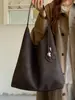 Diseño casual, elegante bolso de hombro de gran capacidad, tendencia de moda 2026, bolso tote simple de nicho para el hombro para mujer