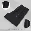 Calças casuais masculinas de outono e inverno, calças de perna reta estilo jogger, corte solto, versáteis, com bolsos, zíper, antifurto, calças esportivas para homens