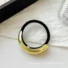 Minimalista y genial lazo geométrico de aleación elástico nuevo y elegante para el pelo cuerda para el pelo versátil diadema vintage elegante